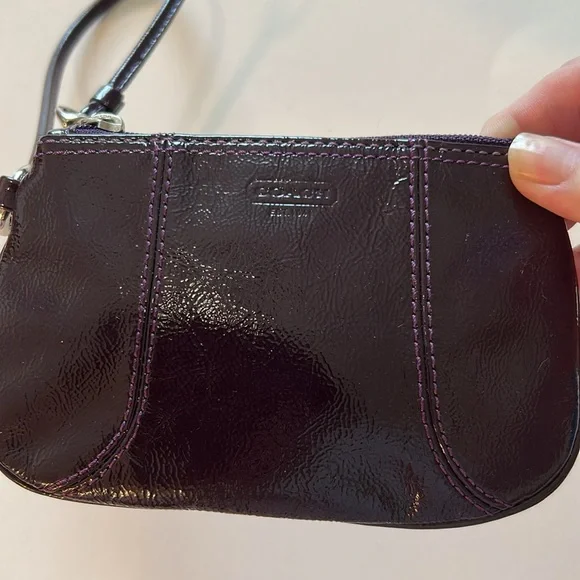 EUC Coach patent leather wristlet in dark purple or plum color and silver metal - Picture 3 of 10